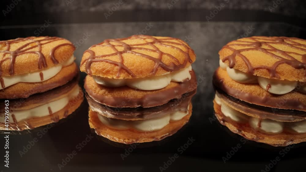 A sweet pastry in close-up - delicious cream biscuit cookies - food photography A sweet pastry in close-up - delicious cream biscuit cookies - food photography