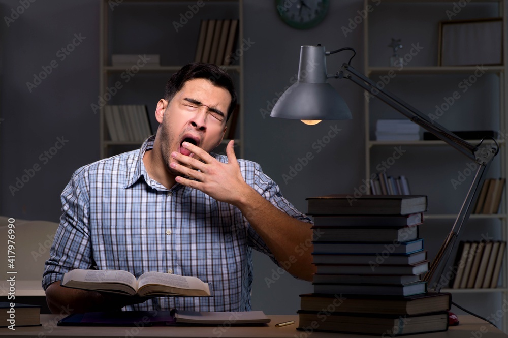 Student preparing for exams late at night Student preparing for exams late at night