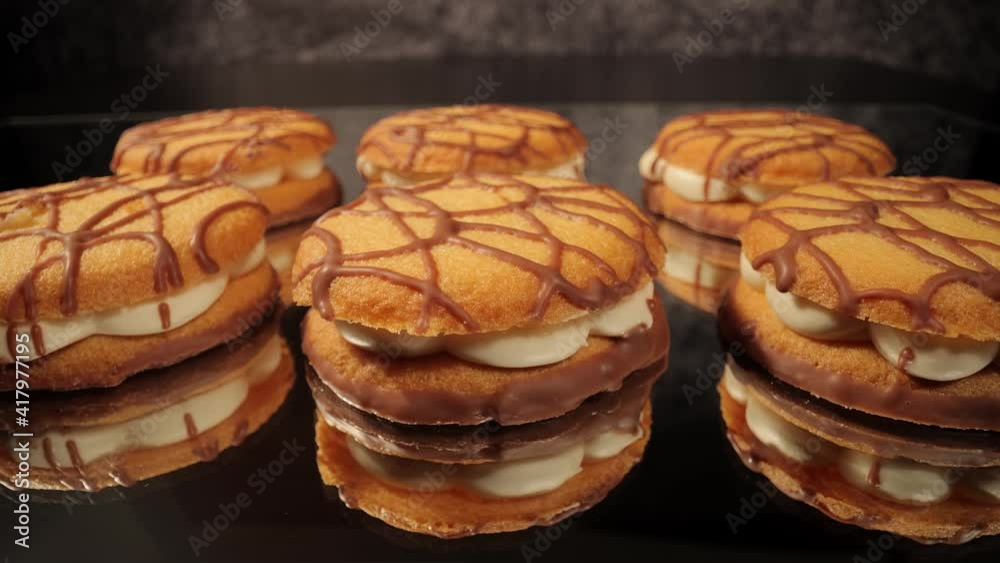 A sweet pastry in close-up - delicious cream biscuit cookies - food photography A sweet pastry in close-up - delicious cream biscuit cookies - food photography
