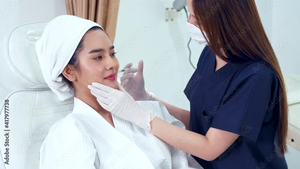 doctor and patent in cosmetologist clinic 