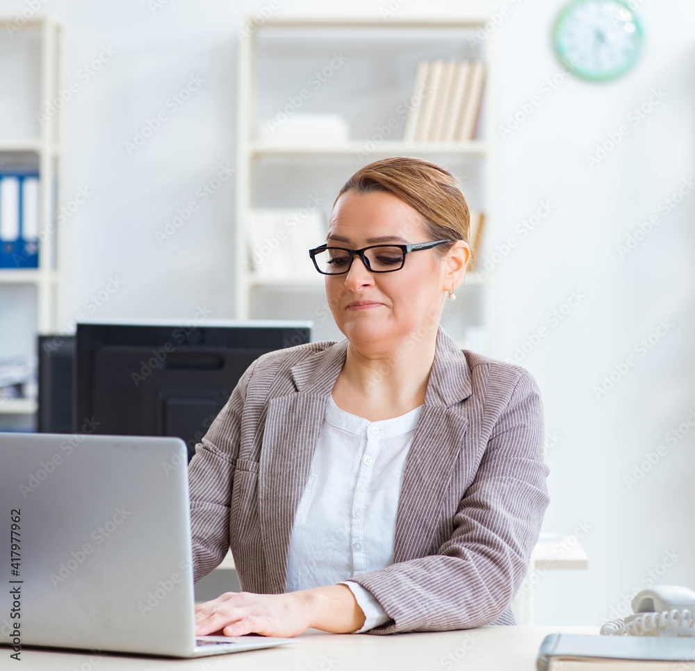Businesswoman employee working in the office Businesswoman employee working in the office