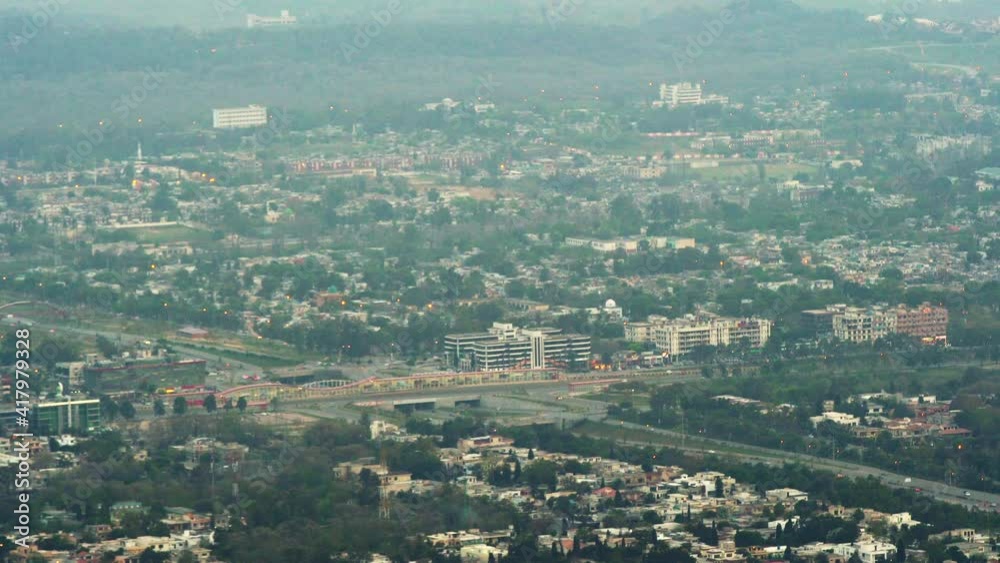 Urban Cityscape Of Car Traffic And Streets In Islamabad, Pakistan Travel Destination Urban Cityscape Of Car Traffic And Streets In Islamabad, Pakistan Travel Destination