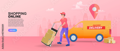 Courier man pushing hand truck dolly with boxes near orange van. Concept of heavy cargo logistics, bulk shipping handling, urban delivery service, and online shopping e-commerce fulfillment.