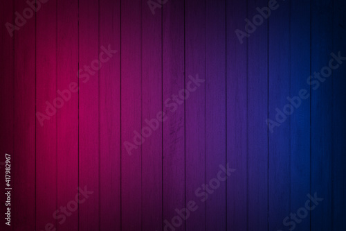 Neon light on wood wall texture background. Lighting effect red and blue neon backgrounds.