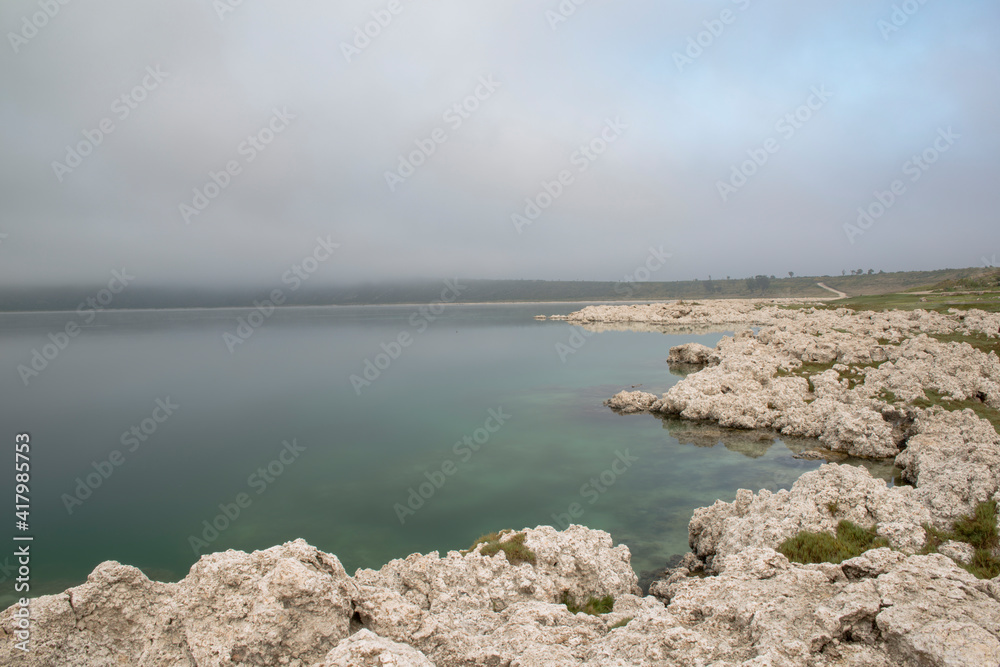 Alchichica Lagoon with mist in Puebla, Mexico. Alchichica Lagoon with mist in Puebla, Mexico.