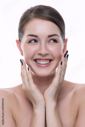Portrait of young adult woman with health skin of face.