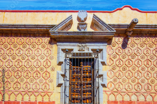 Mexico, Scenic Taxco colonial architecture and cobblestone narrow streets in historic city center near Santa Prisca church.