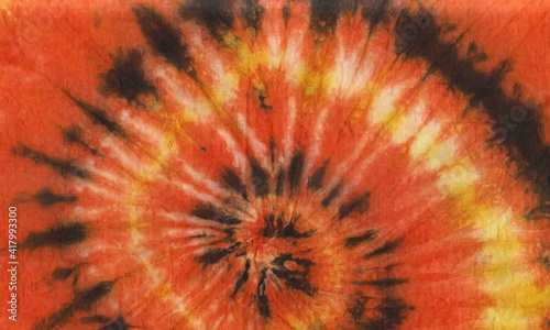 abstract orange spiral tie dye pattern illustration background design. orange yellow blossom floral beautiful wallpaper