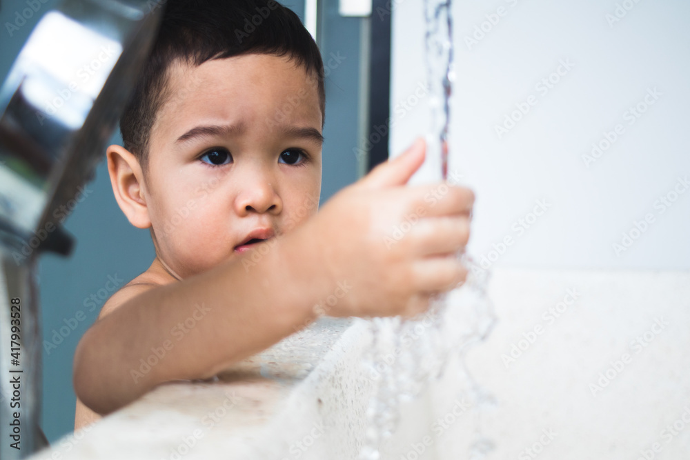 Cute baby boy bath outdoors and playing in a bath.. Stock Photo Adobe Stock
