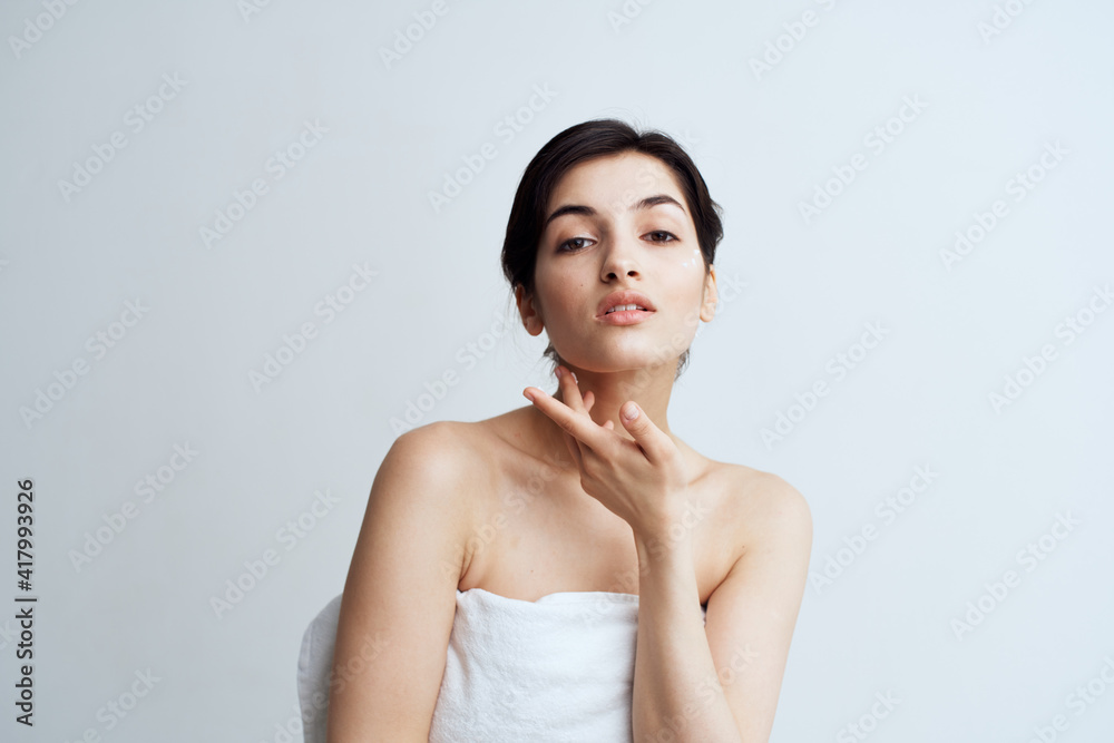 Beautiful brunette clean skin care face dermatology cream Beautiful brunette clean skin care face dermatology cream