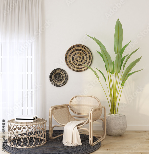home interior with rattan armchair ,book on rattan coffee table ,green plant ,black carpet , cream color  fabric and wood frame,cozy home decorate.