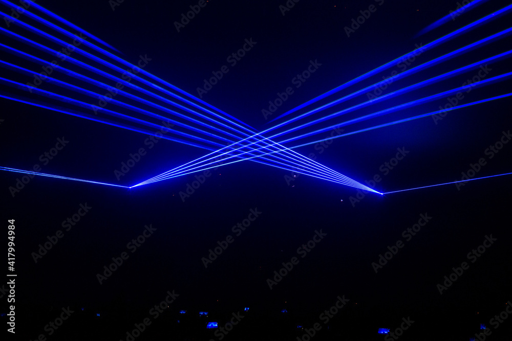 custom made wallpaper toronto digitalBeautiful blue laser beam in concert with crowded people holding the smartphone.