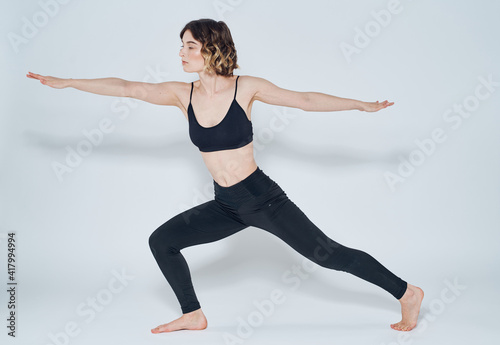 Exercises slim woman yoga asana light background meditation model