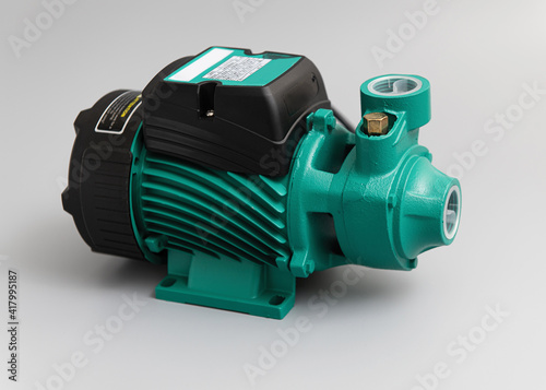 Vortex self-priming pump, top-side view, on a light gray background