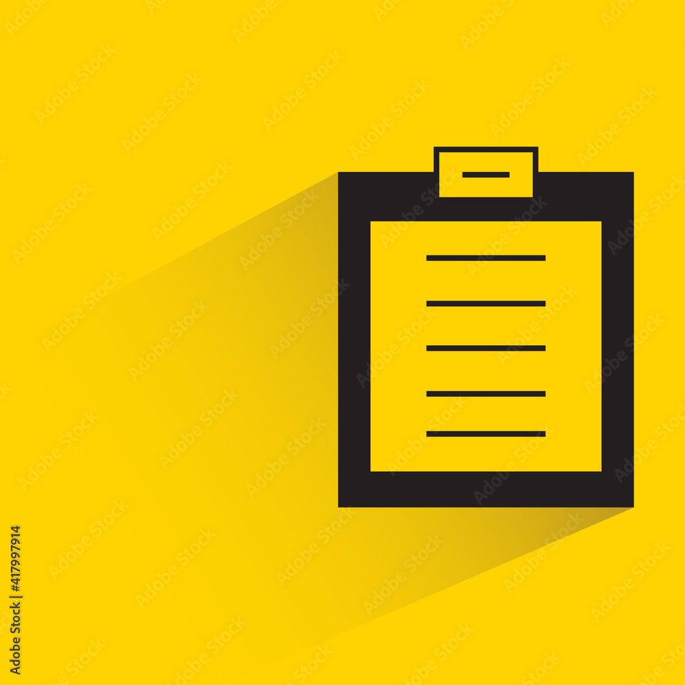 clipboard with shadow on yellow background clipboard with shadow on yellow background