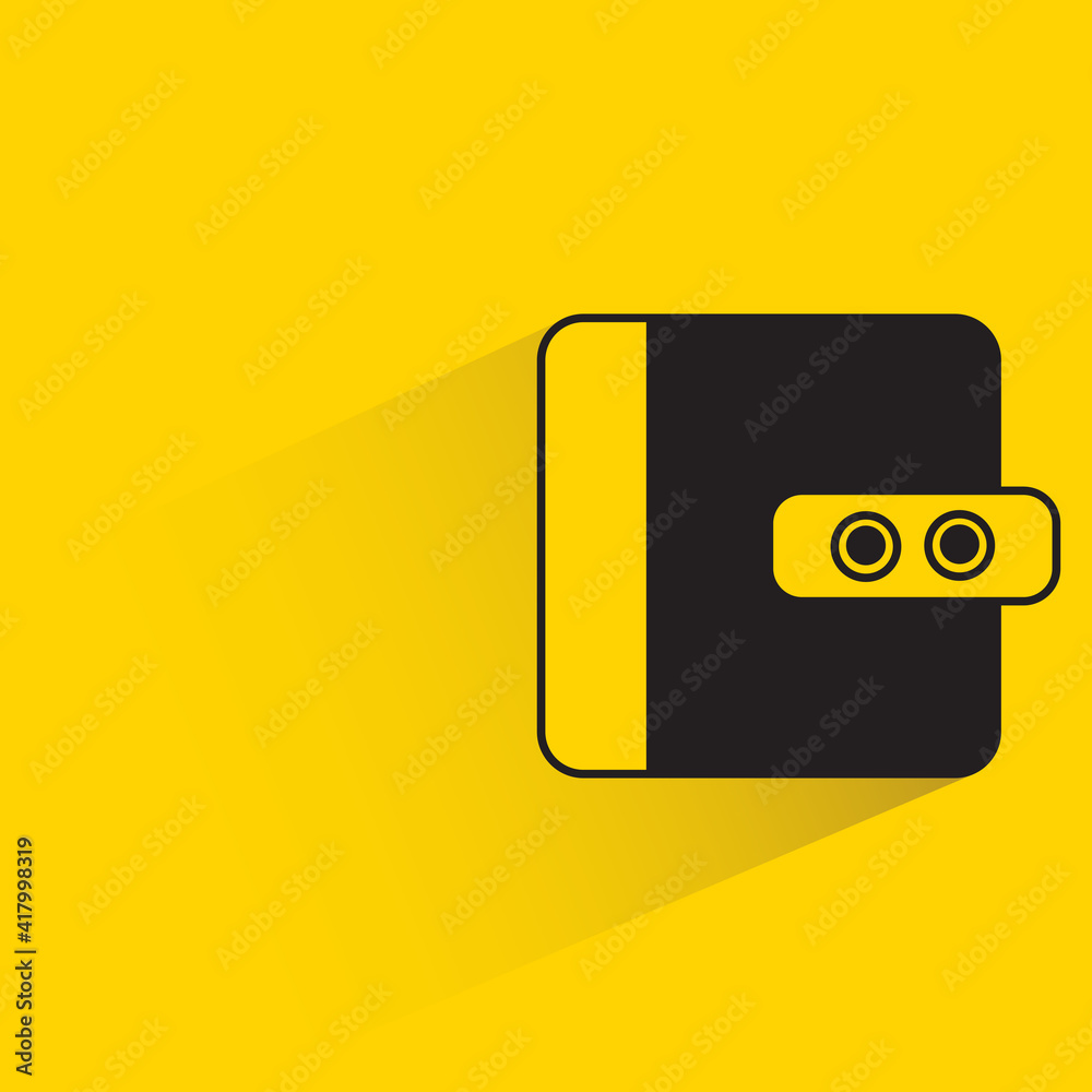 wallet with shadow on yellow background wallet with shadow on yellow background