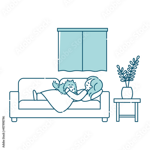 リビングのソファーで犬と一緒に眠る女性