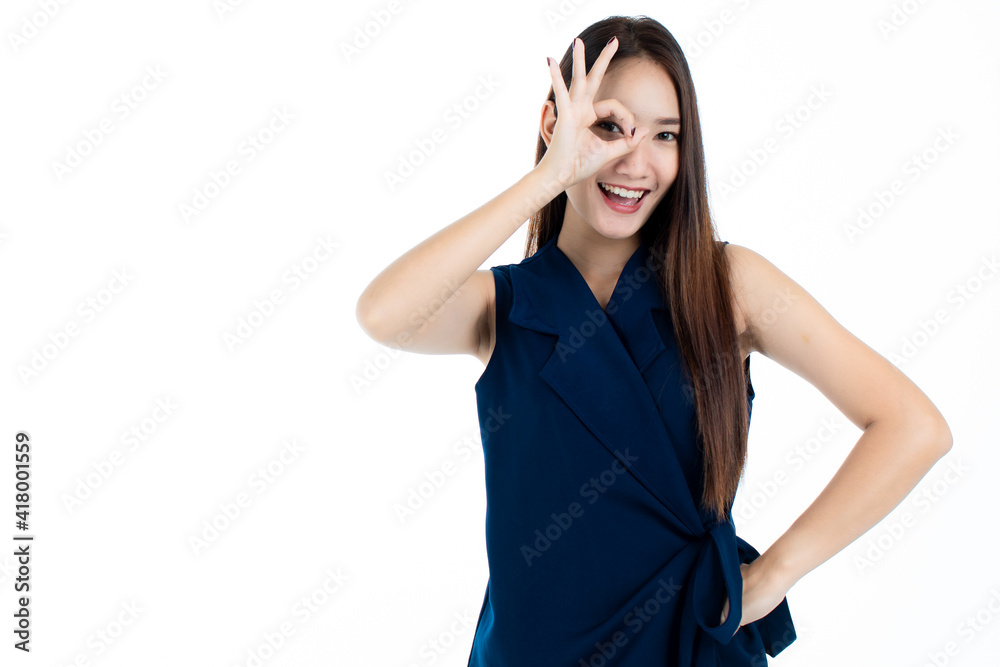 Happy Asian woman gesturing OK Happy Asian woman gesturing OK