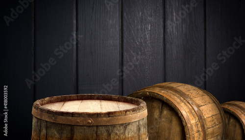 Selected focus empty brown wooden table and wall texture or old black brick wall blur background image. for your photomontage or product display © kishivan