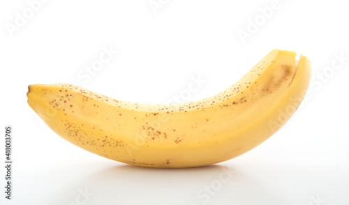 A ripe banana on a white background