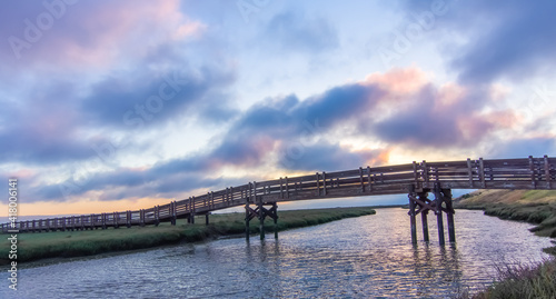 Footbridge crossing Newark Slough at Don Edwards San Francisco Bay National Wildlife Refuge. Fremont, Alameda County, California, USA. photo