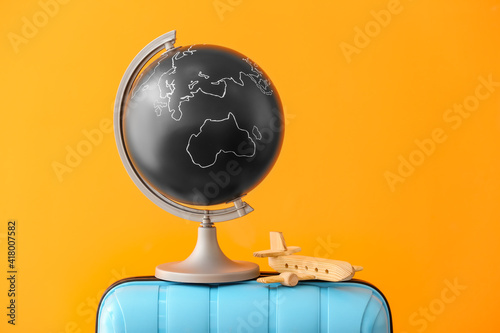 Globe and wooden airplane o...