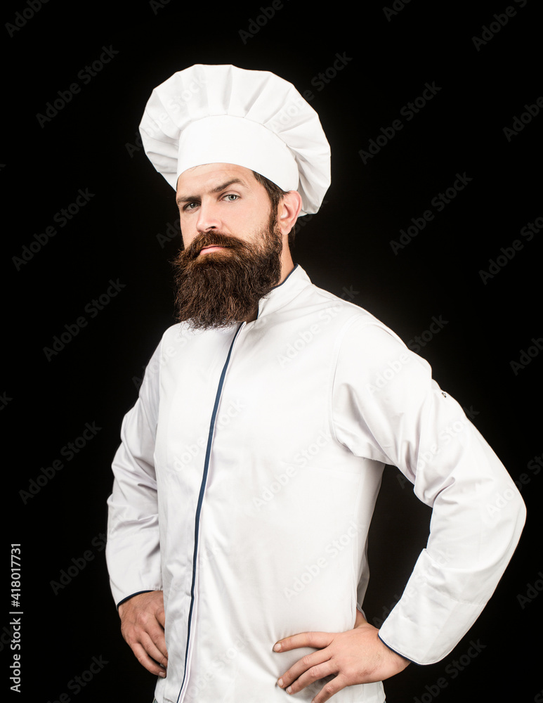 Portrait of a serious chef cook. Bearded chef, cooks or baker. Bearded male chefs isolated on black. Cook hat. Confident bearded male chef in white uniform. Serious cook in white uniform, chef hat Portrait of a serious chef cook. Bearded chef, cooks or baker. Bearded male chefs isolated on black. Cook hat. Confident bearded male chef in white uniform. Serious cook in white uniform, chef hat