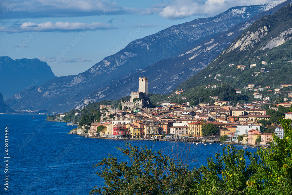 Panoramic view of the old town of Malcesine. Palazzo dei Capitani is a historic building in Italy. Italian resort on Lake Garda. Scaliger Castle in Malcesine Lake Garda Italy.