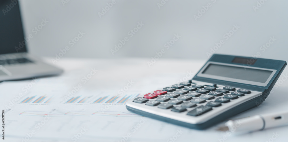 close-up calculator on graph documents, device for calculating the numbers. close-up calculator on graph documents, device for calculating the numbers.