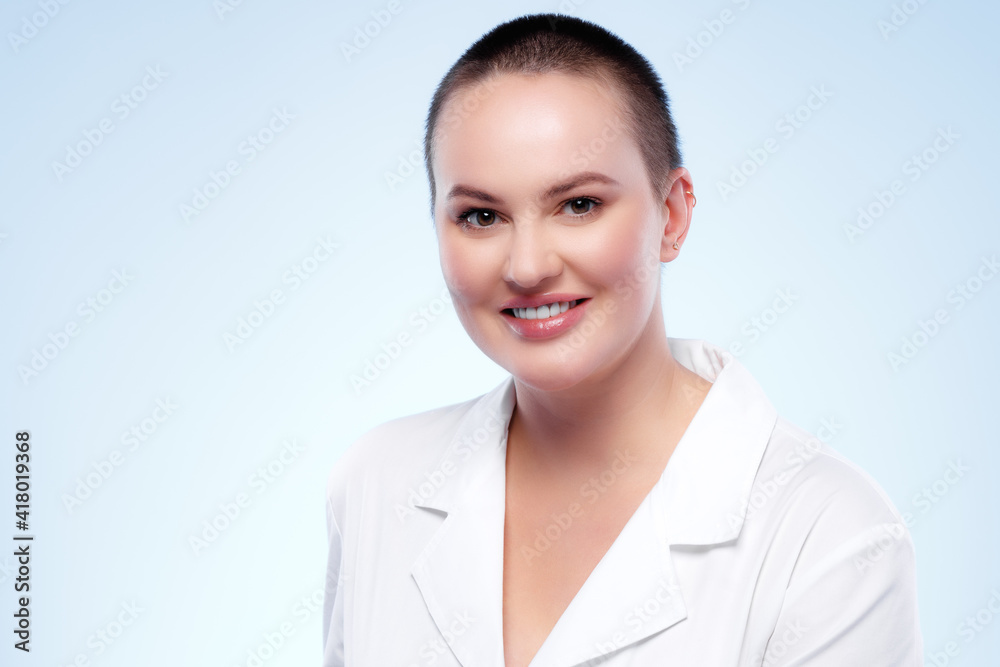 Beauty portrait of a nice young smiling woman with perfect skin