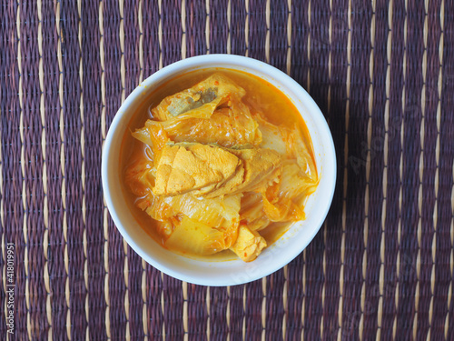 Fish (sea bass) with vegetable spicy soup, Asian food