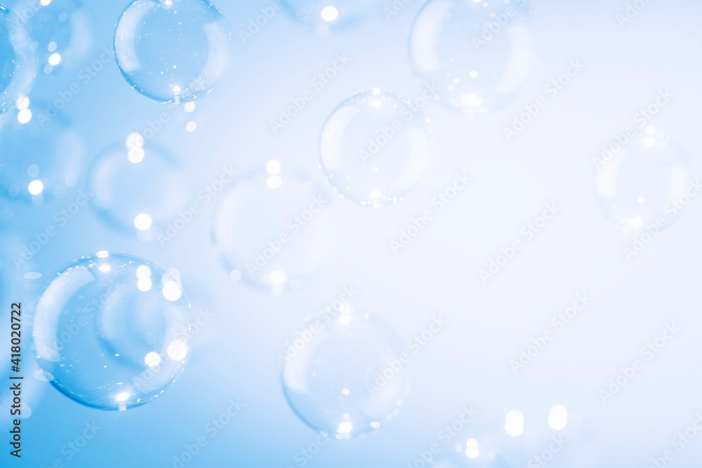 Beautiful shine bright of blue soap bubbles float background. white copy space.