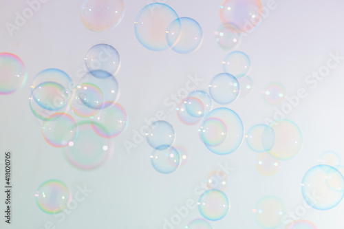 Beautiful fresness of colorful soap bubbles float background.
