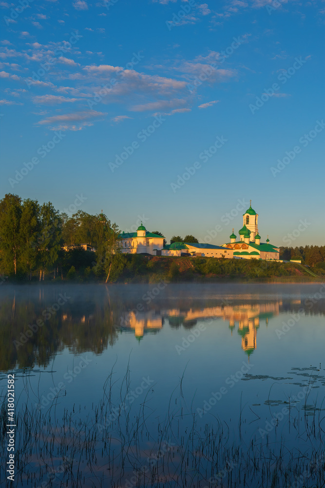 Sunrise over the Holy Trinity Alexander Svirsky Monastery. Holy Trinity Alexander Svirsky Monastery in the Leningrad region, known for architectural monuments of the XVI and XVII centuries.