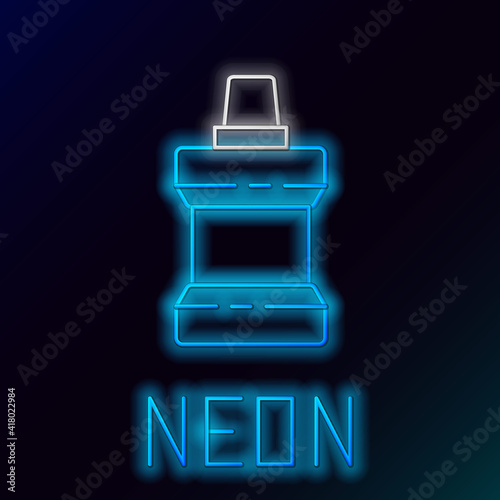 Glowing neon line Mouthwash plastic bottle icon isolated on black background. Liquid for rinsing mouth. Oralcare equipment. Colorful outline concept. Vector.