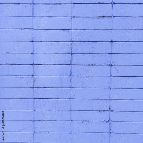 Lilac brick wall. Square violet background. Abstract wallpaper. 