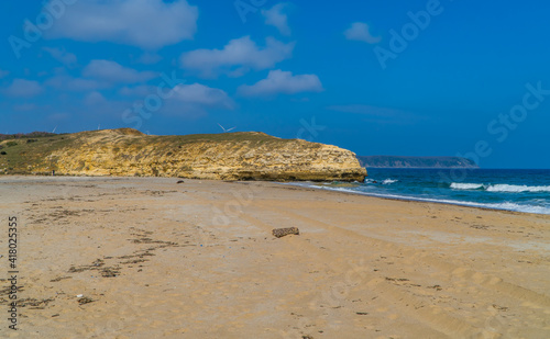 Fototapeta Naklejka Na Ścianę i Meble -  A view of an empty beach in the Black Sea town of Kiyikoy in Northwestern Turkey