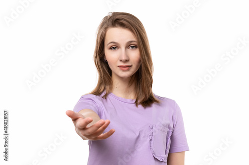 close up pretty girl over isolated white background smiling cheerful offering palm hand giving assistance and acceptance