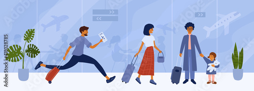 People with luggage waiting for flight in departure hall of international airport