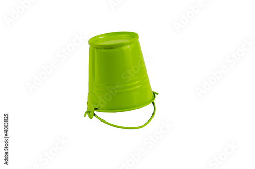 Empty green metal bucket on a white background.