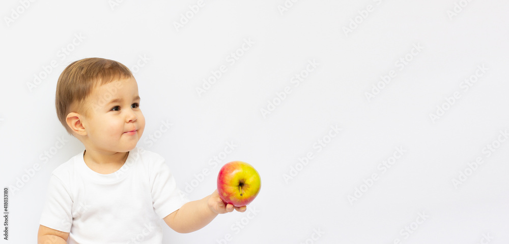 Small caucasian two years old boy with big green apple, isolated on white background Small caucasian two years old boy with big green apple, isolated on white background