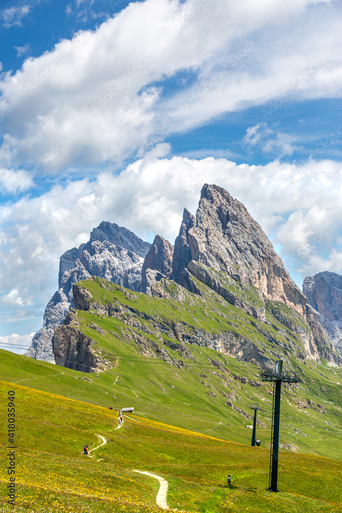 Seceda Mount in summer, flowers and landscape. Dolomites Alps, Italy