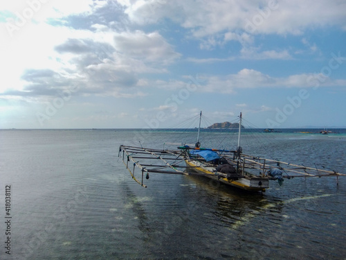 Stunning view  a boat wreck at Pulo Beach  Mesah Island Flores Indonesia