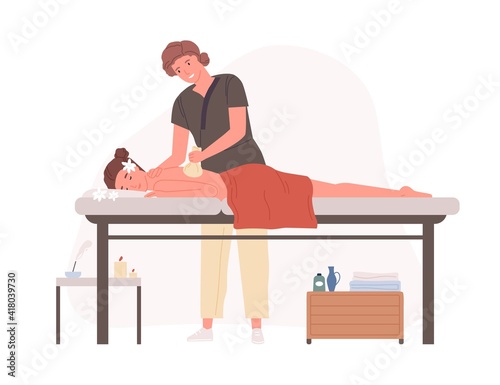 Massage therapist practicing herbal SPA wellness body therapy and aromatherapy. Woman lying and relaxing in beauty salon. Colored flat cartoon vector illustration isolated on white background