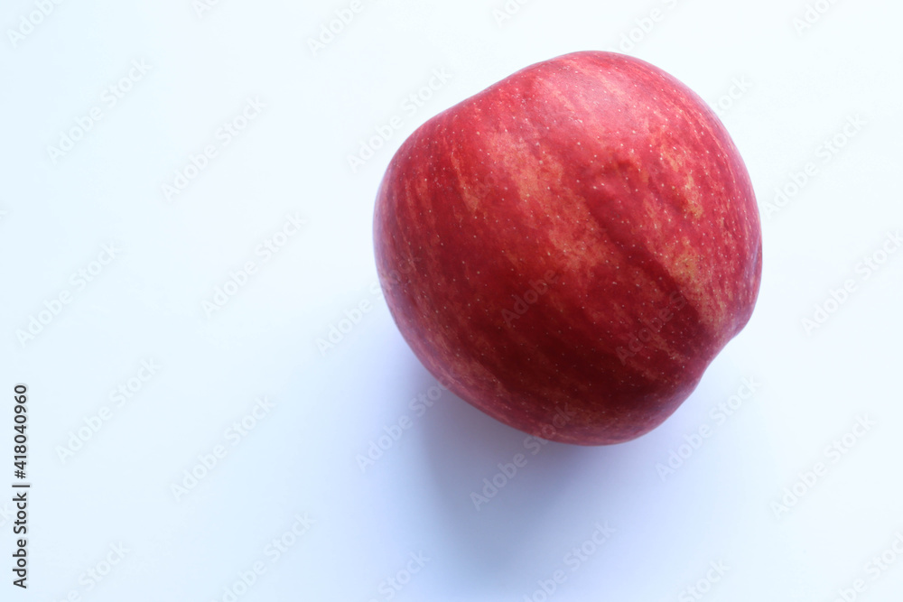 Red apple with copy space isolated on white background closeup. Red apple with copy space isolated on white background closeup.