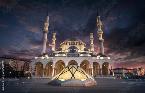 New Melike Hatun Mosque in Ankara, Turkey, close to Genclik Park, in the capital city at sunset photo