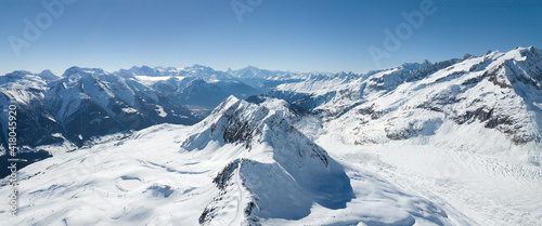 Elselicka Ridge seperates the Great Aletsch Glacier and Fiesch valley, aerial view from Eggishorn. Elselcka Arête is a very challenging hiking route along the Aletsch Glacier. (large stitched file) © Yü Lan