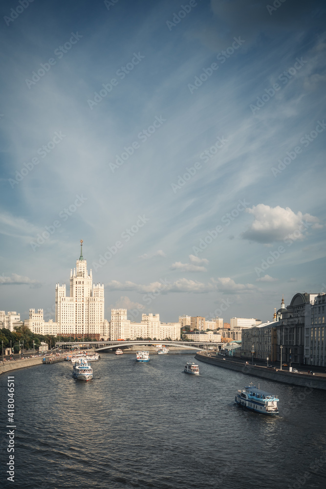 The Moscow River in summer. View of the floating ships in the city. Vertical landscape