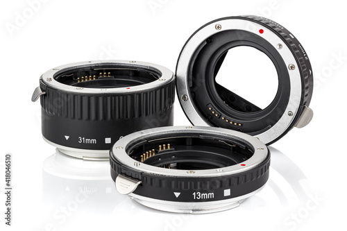 Set of three extension tubes for macro photography by DSLR camera isolated on white background