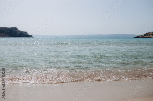 Paradise Beach. Sea horizon and rock. Greece